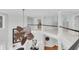 Well-lit foyer with hardwood floors, staircase, and stylish ceiling fan at 4983 Sound View Dr, Mount Pleasant, SC 29466