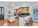 Bright kitchen with stainless steel appliances, dark countertops, and ample cabinet space at 4983 Sound View Dr, Mount Pleasant, SC 29466