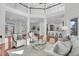 Spacious living room with a high ceiling, wood floors, and an open layout at 4983 Sound View Dr, Mount Pleasant, SC 29466