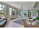 Inviting lobby with elegant chandelier, comfortable seating, and bright natural light at 4983 Sound View Dr, Mount Pleasant, SC 29466