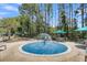 Community splash pad area with seating and shade for residents to enjoy a relaxing day outdoors at 4983 Sound View Dr, Mount Pleasant, SC 29466
