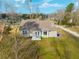 Aerial view of home features a well-maintained lawn and a charming exterior at 5037 Govan Rd, Hollywood, SC 29449