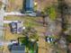 Aerial view of a residential area showcasing neighborhood homes and greenery at 5037 Govan Rd, Hollywood, SC 29449