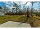 Expansive backyard with trees and lawn at 5037 Govan Rd, Hollywood, SC 29449