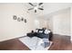 Spacious living room featuring modern furnishings, elegant decor, and hardwood flooring at 5037 Govan Rd, Hollywood, SC 29449