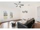 Bright living room with vaulted ceilings, modern furniture, and ample natural light at 5037 Govan Rd, Hollywood, SC 29449