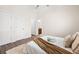 Cozy bedroom features a queen-size bed, plush rug, and hardwood floors, plus neutral paint at 5037 Govan Rd, Hollywood, SC 29449