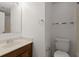 Simple bathroom with a single vanity, toilet, and towel rack at 509 Reserve Way, Summerville, SC 29485