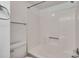 Bathroom shower and toilet featuring white tile and chrome fixtures at 509 Reserve Way, Summerville, SC 29485