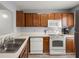 Bright kitchen with stainless steel appliances and wooden cabinets at 509 Reserve Way, Summerville, SC 29485
