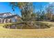 View of a small pond next to townhomes in the neighborhood at 509 Reserve Way, Summerville, SC 29485