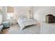 Calm bedroom showcasing natural light, soothing colors, and tasteful decor at 5742 Kiawah River Dr, Johns Island, SC 29455