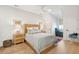 Comfortable bedroom with a woven headboard, light blue bedding, and a window seat at 5742 Kiawah River Dr, Johns Island, SC 29455