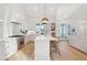 Modern kitchen featuring stainless steel appliances, a large island with seating, and an open layout at 5742 Kiawah River Dr, Johns Island, SC 29455