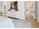 Bright main bedroom with ensuite bathroom and large dresser at 5742 Kiawah River Dr, Johns Island, SC 29455