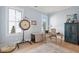 Bright office with hardwood floors, natural light, eclectic decor, and neutral color palette at 5742 Kiawah River Dr, Johns Island, SC 29455