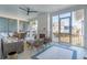 Inviting screened porch featuring comfortable seating, a fireplace, and outdoor dining area at 5742 Kiawah River Dr, Johns Island, SC 29455