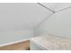 Bright attic space featuring hardwood floors, a clean finish, and ample potential at 6294 Highway 165, Ravenel, SC 29470