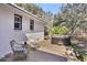 Backyard deck featuring a hot tub and seating area, perfect for relaxation and outdoor enjoyment at 6294 Highway 165, Ravenel, SC 29470