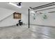 A large basement with concrete floor, storage cabinet, and windows providing natural light at 6294 Highway 165, Ravenel, SC 29470