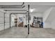 Spacious garage interior featuring abundant storage and a convenient staircase to the main level at 6294 Highway 165, Ravenel, SC 29470