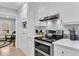 Well-equipped kitchen with a stainless steel oven, sleek countertops, and ample cabinet space at 6294 Highway 165, Ravenel, SC 29470