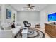 Inviting living room with natural light, neutral tones, area rug, and traditional decor elements at 6294 Highway 165, Ravenel, SC 29470