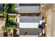 Aerial view of property showcasing well-maintained lawn, modern roof, and proximity to neighborhood amenities at 721 Meeting St, Charleston, SC 29403
