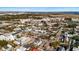 An aerial view shows the neighborhood with commercial and residential buildings, along with trees and street parking at 721 Meeting St, Charleston, SC 29403