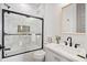 Bright bathroom features a shower-over-tub and a black faucet sink with plenty of counter space at 721 Meeting St, Charleston, SC 29403