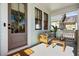 Relaxing front porch with comfortable seating, stylish decor, and a welcoming ambiance at 721 Meeting St, Charleston, SC 29403