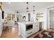 Open concept living space featuring a stylish kitchen island and comfortable living area at 721 Meeting St, Charleston, SC 29403