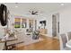 Spacious living room offering lots of natural light and providing comfortable seating and a modern aesthetic at 721 Meeting St, Charleston, SC 29403