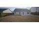 Spacious backyard with a well-maintained lawn, offering plenty of room for outdoor activities and relaxation at 7646 Kinston St, North Charleston, SC 29418