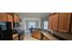 Well-appointed kitchen features granite countertops, stainless steel appliances, and ample cabinet space for storage and meal preparation at 7646 Kinston St, North Charleston, SC 29418