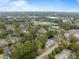 This aerial shot shows the property's location within a lush, tree-filled neighborhood, highlighting surrounding amenities at 907 Pauline Ave, Charleston, SC 29412