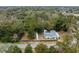 Spacious lot featuring a single-Gathering home, RV storage, and surrounded by lush, mature trees for privacy at 907 Pauline Ave, Charleston, SC 29412