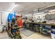 Organized garage space with ample tools, shelving, and workbench for projects and storage at 907 Pauline Ave, Charleston, SC 29412