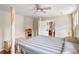Bright bedroom with a four post bed, ceiling fan and an entrance into another room at 907 Pauline Ave, Charleston, SC 29412