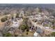 An aerial view shows a residential community surrounding a picturesque pond and sprawling golf course at 101 S Gateshead Crossing, Goose Creek, SC 29445