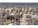 An elevated shot shows homes nestled in a neighborhood near a pond and sprawling golf course at 101 S Gateshead Crossing, Goose Creek, SC 29445