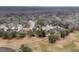 An aerial view of a community with well-maintained lawns, mature trees and winding streets at 101 S Gateshead Crossing, Goose Creek, SC 29445