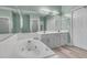 A bathroom with a tub, a shower, a double sink vanity, and a large mirror at 101 S Gateshead Crossing, Goose Creek, SC 29445