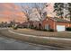 A well-maintained street featuring beautiful brick homes with manicured lawns and mature trees at 101 S Gateshead Crossing, Goose Creek, SC 29445