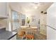 Bright breakfast nook with natural light, dining table, and cabinet for storage at 102 Shoveler Pl, Summerville, SC 29485