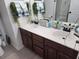 This bathroom features a double sink vanity with decorative towels and greenery for a spa-like feel at 110 Greyson Cir, Goose Creek, SC 29445