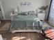 Relaxing bedroom features a comfortable bed, matching nightstands with lamps, and ample natural light at 110 Greyson Cir, Goose Creek, SC 29445