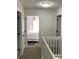 Hallway with white trim and neutral carpet, leading to bedrooms at 110 Greyson Cir, Goose Creek, SC 29445