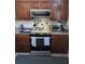 This kitchen features stainless steel appliances, including a range, microwave and plenty of counter space at 110 Greyson Cir, Goose Creek, SC 29445