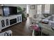 Comfortable living room features a large television, fireplace, and plush white sofa, perfect for relaxing and entertaining at 110 Greyson Cir, Goose Creek, SC 29445